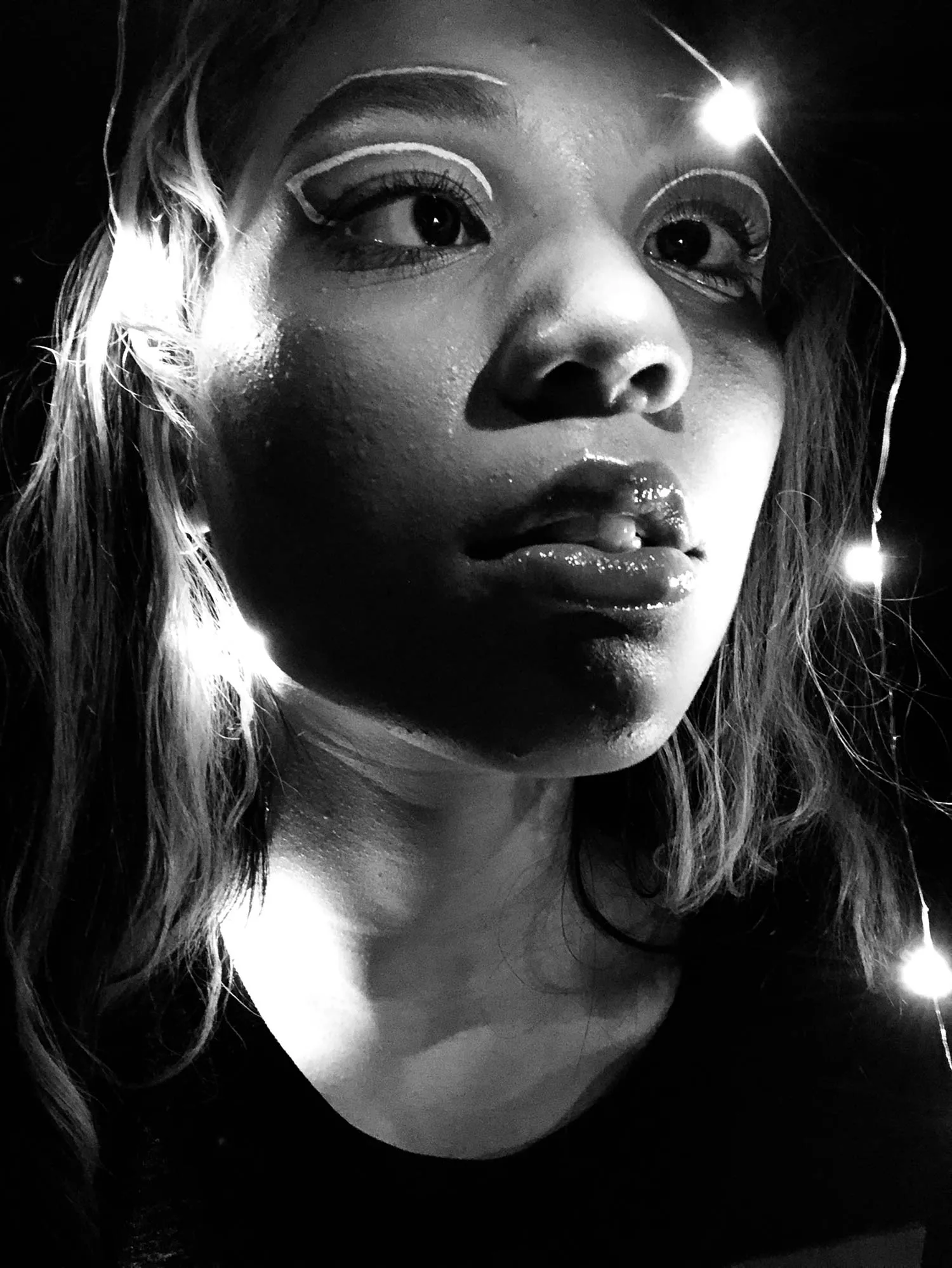 The face of a person with makeup.